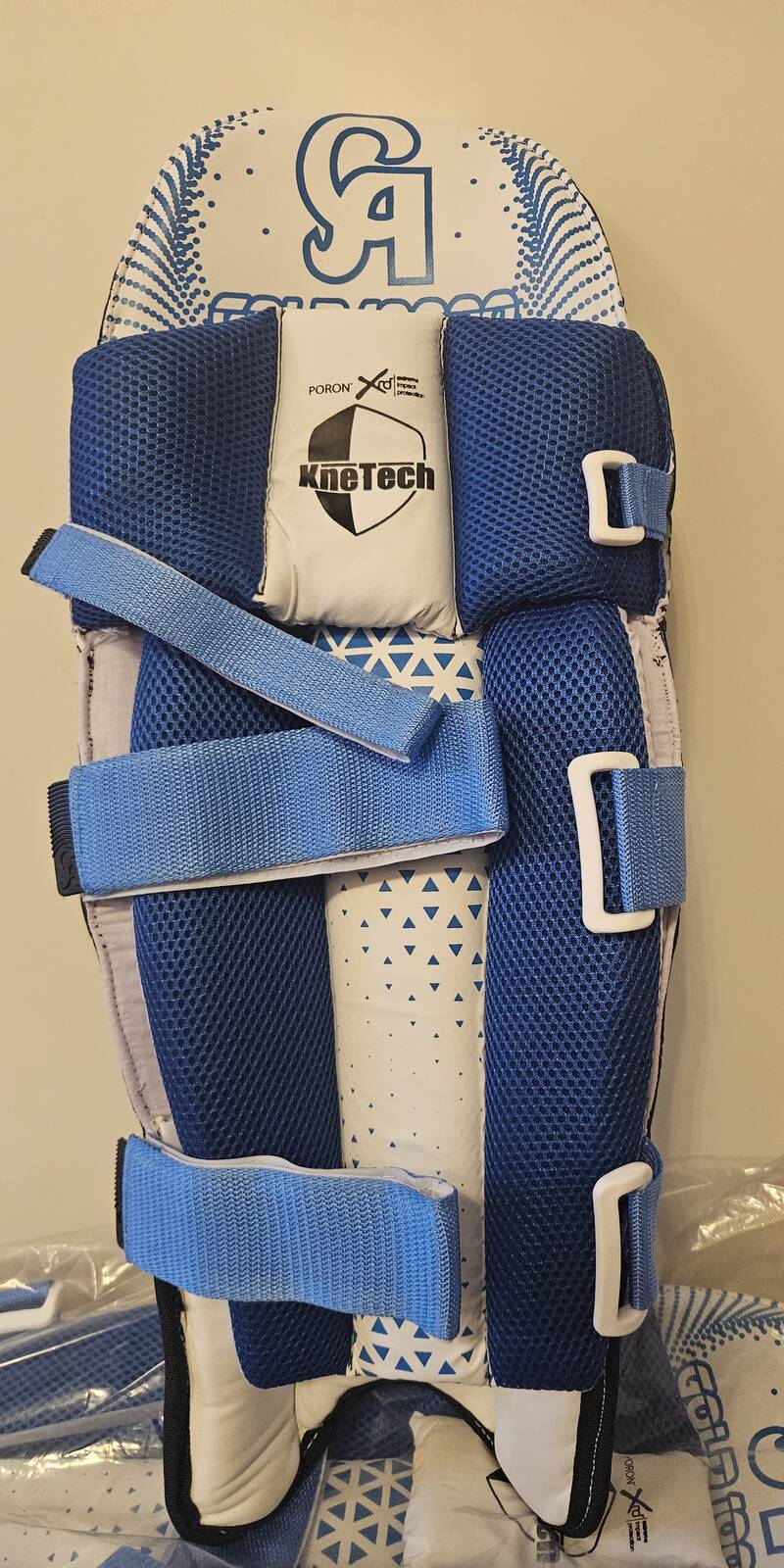 CA Gold Youth batting pads, front view